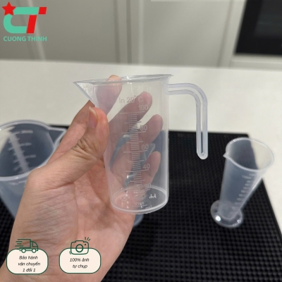 Ca đong định lượng có chia vạch, có quai cầm dung tích 100ml